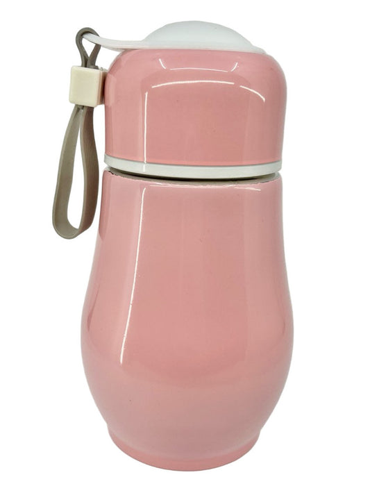 Pink insulated drink bottle with a strap on a white background